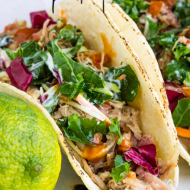 Slow Cooker Pulled Pork Tacos are unbelievably tender, juicy, versatile, and easy to make in your Crock-Pot! They are great for large crowds, busy nights, and make-ahead meals. #pork #pulledpork #recipe #slowcooker #tacos #easy #Mexican #Crockpot #carnitas