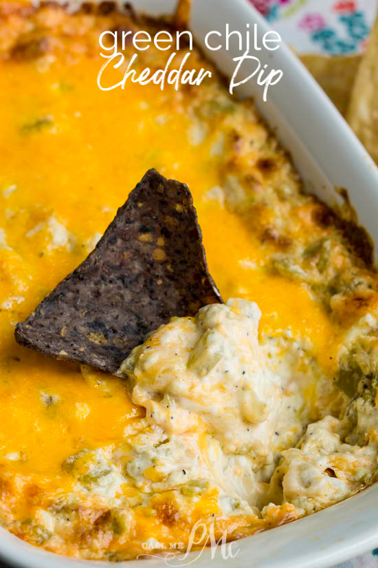 A close up of a casserole dish with Green Chile Cheddar Dip in it.