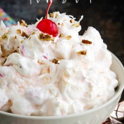 Ambrosia Fluff Salad - Light, sweet, and loaded with sweet pineapples, mandarin oranges, and cherries, this classic Southern no-bake dessert is always a crowd favorite. #fruit #salad #recipe #easy #ambrosia #fluff #coolwhip #sourcream #recipe