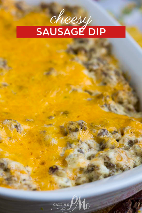 Cheesy Sausage Dip is always a crowd-pleaser and perfect for a party. This recipe is cheesy, flavorful, and totally irresistible! #cheese #cheddar #dip #sausage #party #recipe #entertaining A white dish full of meat and metled cheese.