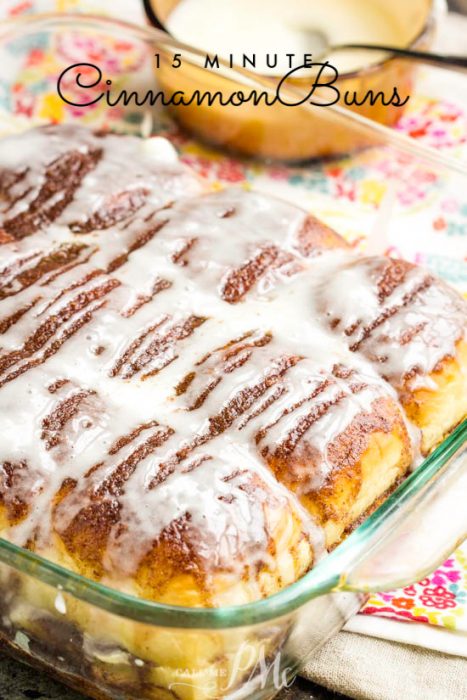 cinnamon buns in a glass baking dish.