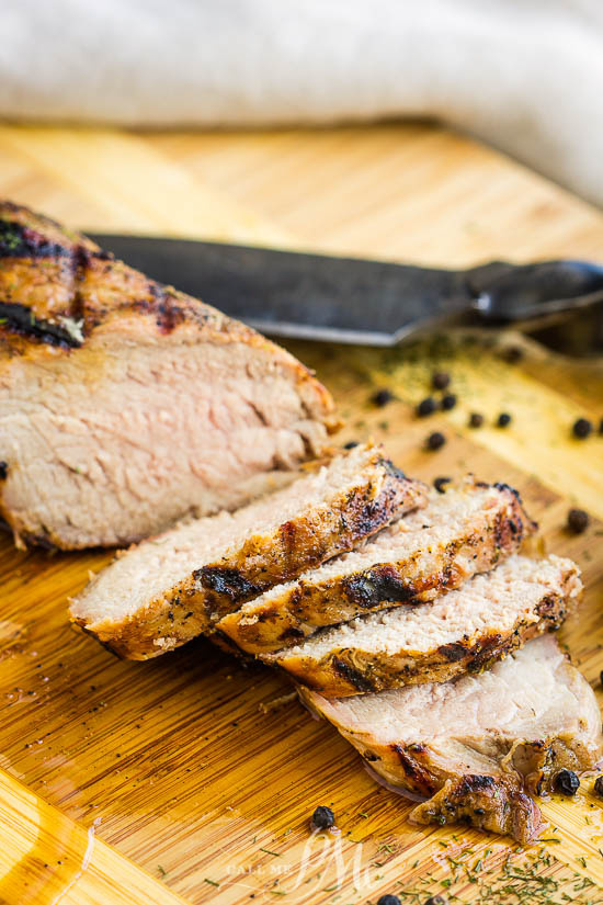 Dill Pickle Brined Grilled Pork is the juiciest, tender, and best pork tenderloin I've ever had! Pickle juice marinade recipe. How long to brine. #brine #pork #grilling #recipe #recipeoftheday #pickle #dillpickle