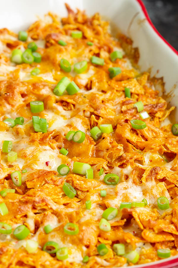 Chicken Doritos Casserole Recipe has a creamy flavor sauce, chicken, cheese, no 'cream of' soup, and topped off with crunchy, family-favorite Doritos chips! #chicken #casserole #dinner #Doritos #recipe #chips #cornchips Chicken Doritos Casserole