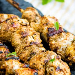 Grilled Chicken Shawarma Skewers is tender chicken breasts cut and coated in a flavorful marinade, then grilled to golden brown perfection. #chicken #grilled #shawarma #Greek #Mediterranean #kabobs #skewers