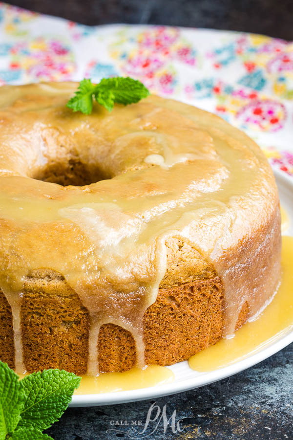 This delicious Cinnamon Crack Cake Recipe is spiced with cinnamon and topped with a rich butter sauce. #cake #bundtcake #dessert #cinnamon #recipes Cinnamon Cake