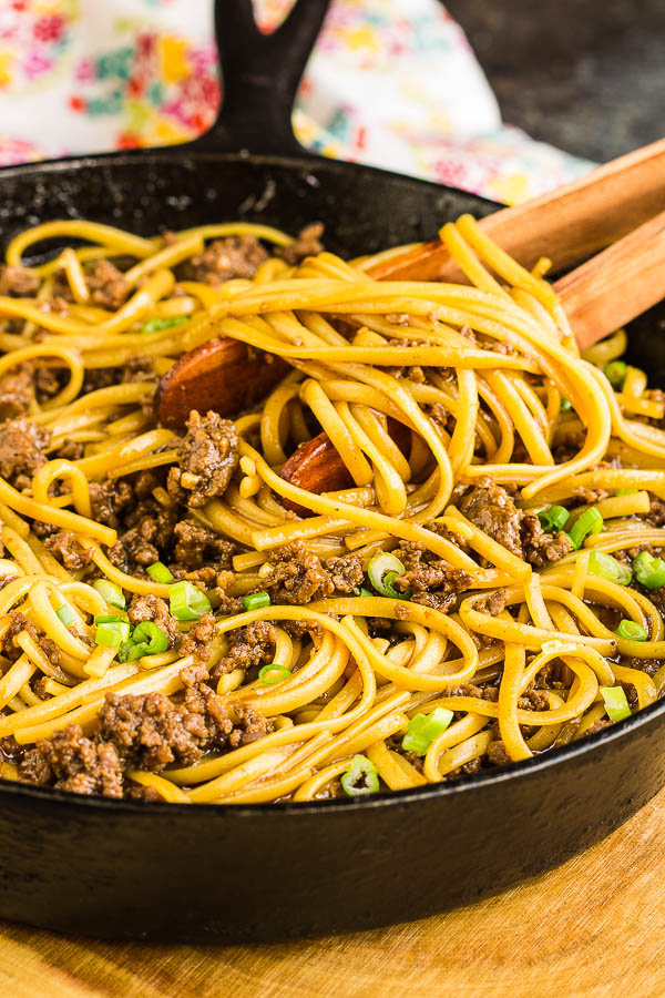 beef and linguine in a cast iron skillet with green onions Ground Beef Mongolian Noodles