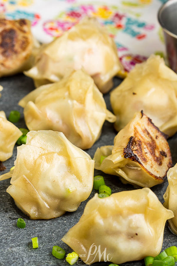 Ground Turkey Pot Stickers are the perfect appetizer and highly addictive! This recipe is very easy to make! #turkey #groundturkey #potstickers #garlic #asian #dumplings Ground Turkey Pot Stickers on platter.