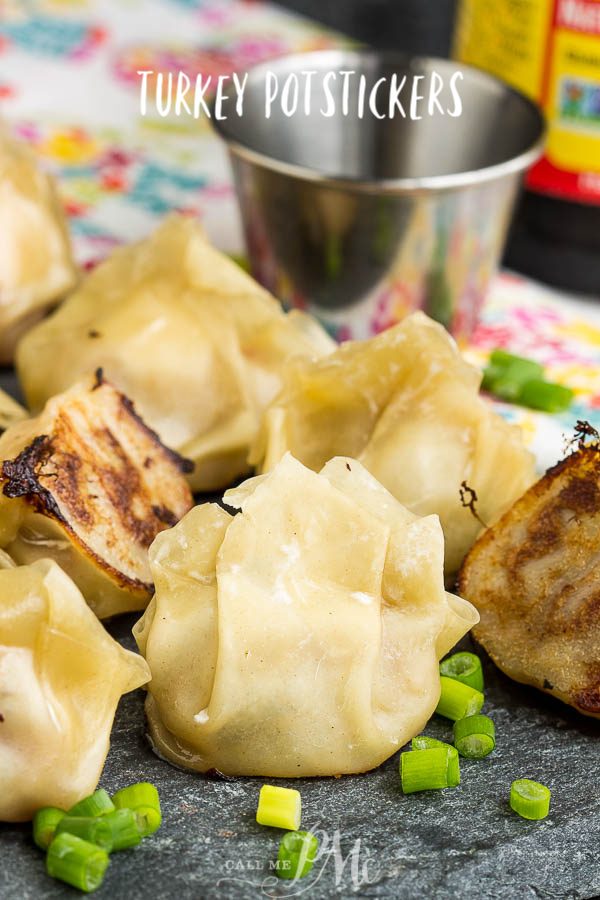 Ground Turkey Pot Stickers are the perfect appetizer and highly addictive! This recipe is very easy to make! #turkey #groundturkey #potstickers #garlic #asian #dumplings Pile of dumplings on platter.