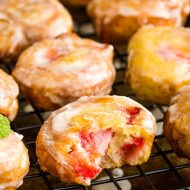 Highly addictive, Glazed Strawberry Fritters are crispy on the outside while being soft, fluffy, and loaded with strawberries on the inside. #recipe #fritters #strawberry #donut #doughnut #recipe #dessert #breakfast #homemade