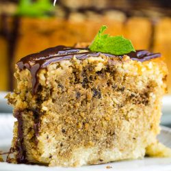 Buttery and tender, Tiramisu Pound Cake Recipe is a pound cake flavored with espresso and rum. It's a twist on two classic recipes, but even more delicious. #poundcake #cake #poundcakepaula #dessert #recipe #tiramisu #coffee #Kahlua