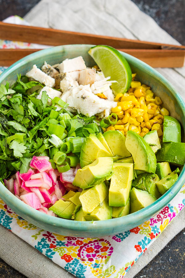 Avocado Chicken Salad Recipe is a hearty mix of grilled chicken, avocado, corn, onions, cilantro, and lime juice. #avocado #chicken #salad #chickensalad #recipe #food #eat #easy #lunch #dinner #picnic Avocado Chicken Salad