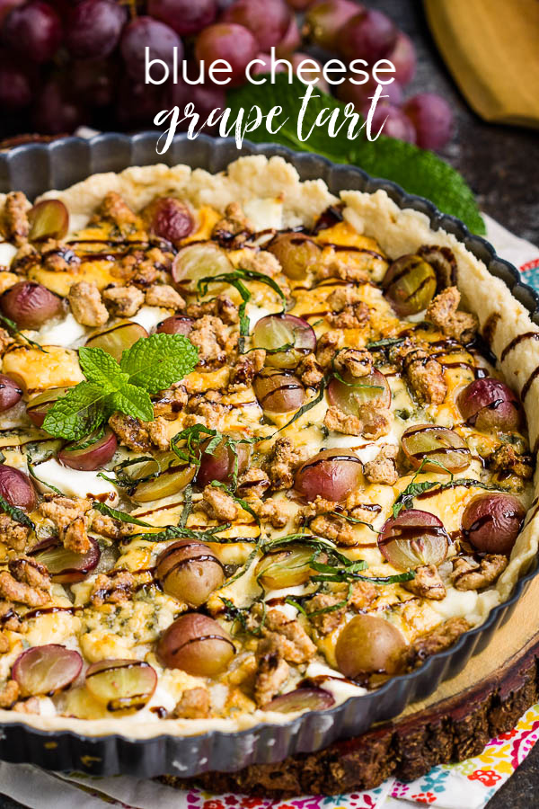 This savory Blue Cheese Grape Tart recipe has bold and interesting flavors. It makes a great appetizer or a decadent lunch paired with a green salad. #bluecheese #tart #grapes #redwine #walnuts #candiedwalnuts #appetizer #recipe #Vintijrestaurant #Vintij Blue Cheese Grape Tart