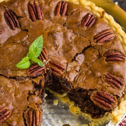 Rich, indulgent, and gooey, Chocolate Fudge Pecan Pie Recipe is quick and easy, requires no mixer, and has no corn syrup! It's a delicious new classic! #chocolate #fudge #pecan #pecanpie #chocolatepie #dessert #recipe