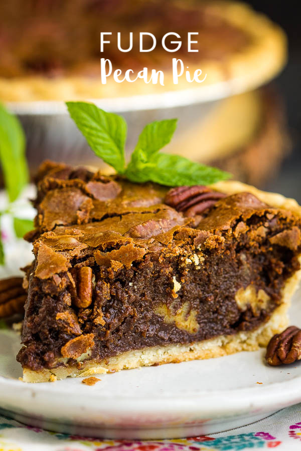Rich, indulgent, and gooey, Chocolate Fudge Pecan Pie Recipe is quick and easy, requires no mixer, and has no corn syrup! It's a delicious new classic! #chocolate #fudge #pecan #pecanpie #chocolatepie #dessert #recipe Chocolate Fudge Pecan Pie