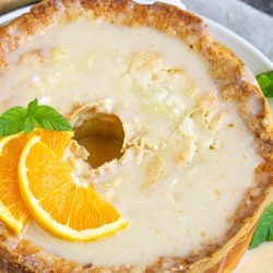 Whip up this super tasty glazed Citrus Pound Cake to make the most of the citrus season! #lemon #orange #cake #poundcake #poundcakepaula #dessert #recipe #moist #paula #homemade #bundt