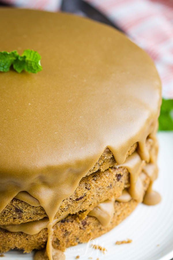Three layer jam cake with caramel frosting dripping down sides Best Southern Layered Jam Cake