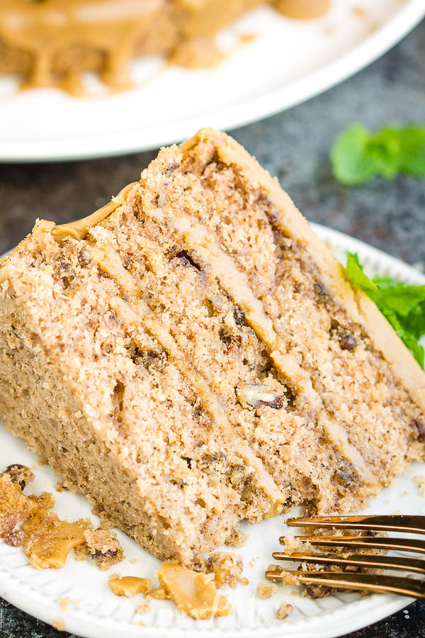 Three layer jam cake with caramel frosting dripping down sides Best Southern Layered Jam Cake