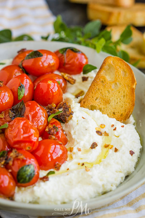 Whipped Feta with Blistered Tomatoes, In this recipe, whipped feta adds a creamy and salty zing and is perfectly balanced by the slightly sweet blistered tomatoes! #feta #cheese #dip #spread #recipe #tomato #grapetomato #cherrytomatoes #appetizer #easy #bruschetta
