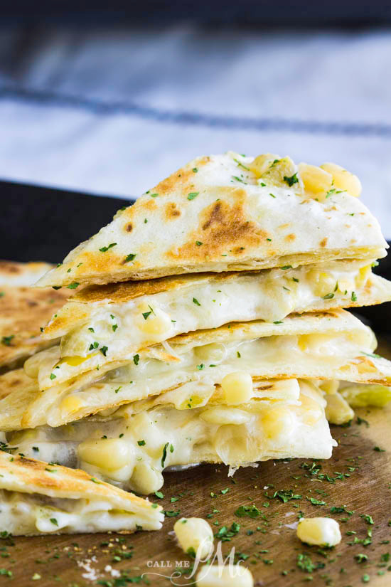 Green Chile Cheese Quesadillas are filled with gooey cheese, zesty green chilies, and toasted in a flour tortilla. #quesadilla #TexMex #greenchile #corn #cheese #dinner #easy #lunch #recipe