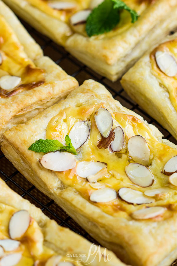Almond Puff Pastry Danish takes advantage of premade puff pastry for the no-fail pastry base that's filled with a cream cheese honey mixture & topped with almond slivers. #puffpastry #danish #recipe #breakfast #brunch #dessert #almond #baked #homemade #semihomemade Almond Puff Pastry Danish