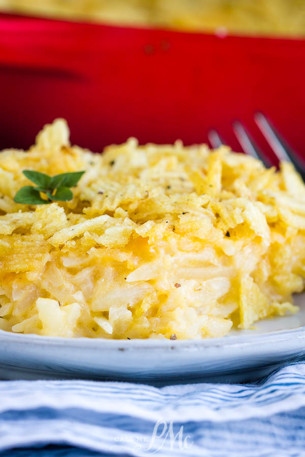 Hashbrown Potato Casserole No Cream Soup, this particular recipe is also known as Funeral Potatoes. It's creamy, rich, and super easy to put together. #casserole #hashbrown #potatoes #funeralpotatoes #cheese #recipe #easy #holidays #potluckrecipe #potluck Hashbrown Potato Casserole No Cream Soup