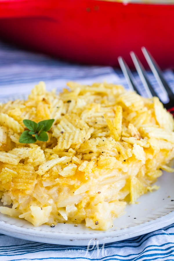 Hashbrown Potato Casserole No Cream Soup, this particular recipe is also known as Funeral Potatoes. It's creamy, rich, and super easy to put together. #casserole #hashbrown #potatoes #funeralpotatoes #cheese #recipe #easy #holidays #potluckrecipe #potluck Hashbrown Potato Casserole No Cream Soup