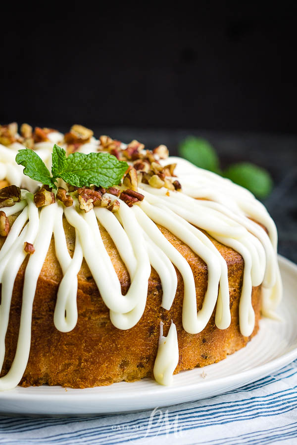 A twist on the classic layer cake, Hummingbird Cake Pound Cake is the ultimate dessert recipe! #cake #poundcake #poundcakepaula #dessert #recipe #bananacake #pineapple #pecans #Thanksgiving #holidayfood #holidayrecipes Hummingbird Cake Pound Cake