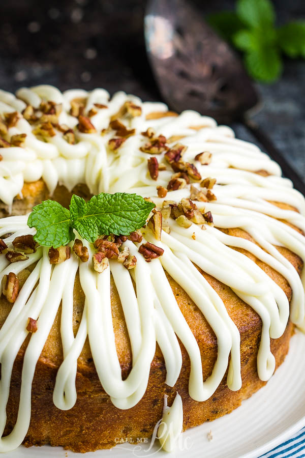 A twist on the classic layer cake, Hummingbird Cake Pound Cake is the ultimate dessert recipe! #cake #poundcake #poundcakepaula #dessert #recipe #bananacake #pineapple #pecans #Thanksgiving #holidayfood #holidayrecipes Hummingbird Cake Pound Cake