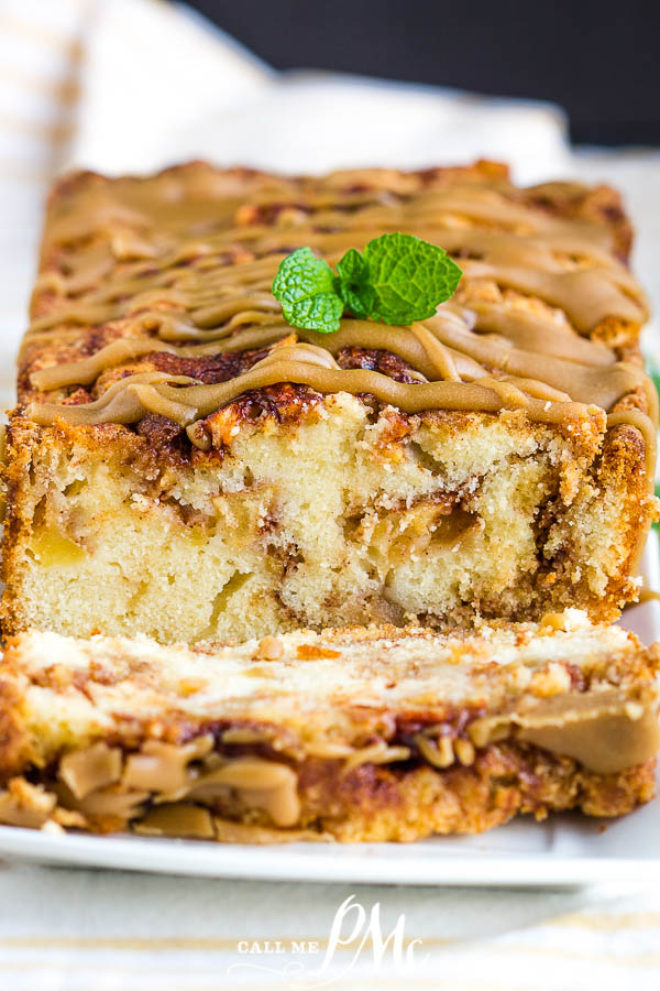 Amish Apple Bread Recipe is loaded with apples and cinnamon and topped with caramel. It's soft, moist, sweet, and delicious, the ultimate fall comfort. #apples #applebread #bread #quickbread #recipe #callmepmc #cinnamon #baking #easy #moist Amish Apple Bread with the end sliced off.