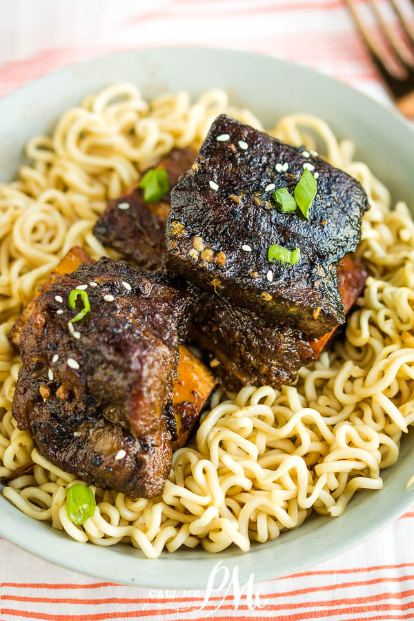 Tender, fall-off-the-bone Braised Korean Spicy and Sweet Short Ribs are sautéed then slow-cooked in a rich Korean marinade. #shortribs #ribs #Koreanfood #recipe #sweetheat #sweetspicy #spicysweet #Asian #slowcooker Short Ribs