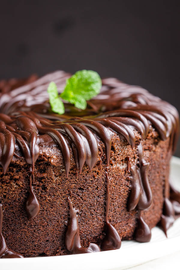 Buttery, dense yet tender and moist, Sour Cream dark chocolate pound cake is quick and easy to make with simple ingredients. #recipe #cake #poundcake #homemade #fromscratch #poundcakepaula #Southern #dessert #moist #easy #chocolate #darkchocolate