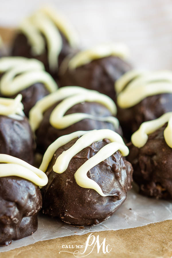 Dangerously-delicious, rich, and decadent, KitKat Truffle Recipe is an easy 3 ingredient, no-bake recipe that's perfect to make with children and to give as gifts for the holidays. #truffles #recipes #candy #chocolate #dessert #gift #Kitkat #candybar KitKat Truffle on display.