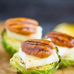 Gluten free · Serves 10 · The ultimate appetizer recipe!! Roasted Brussel sprouts with brie cheese, pecans, & hot honey! These tiny bites are the perfect appetizer or game day food that everyone go crazy about! #hothoney #superbowl #healthyappetizers #gameday #brusselsprouts #appetizerrecipes