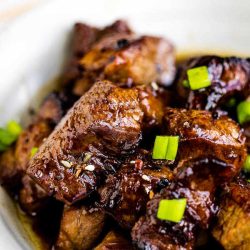Bourbon Honey Steak Tips - This recipe makes tender, succulent, flavorful, and easy steak tips that are perfect for a fast meal or hearty appetizer. #honey #bourbon #steak #steaktips #appetizer #dinner #entree #dinnerrecipes #steakrecipes #appetizer #footballfood #tailgatingfood #tailgatingrecipes