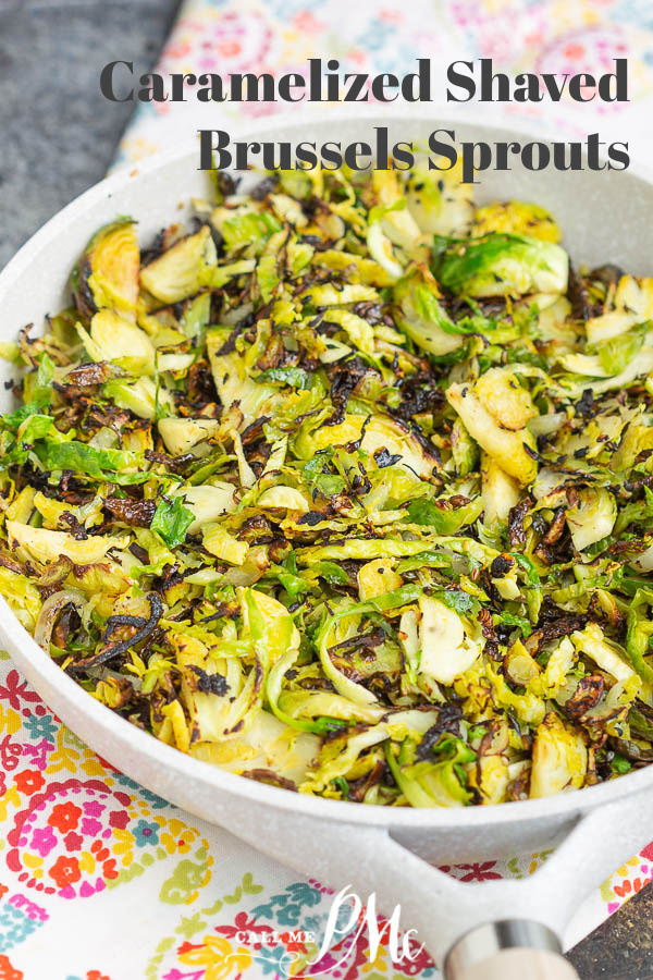 Bowl full of shaved green vegetables Carmaelzied Shaved Brussels Sprouts