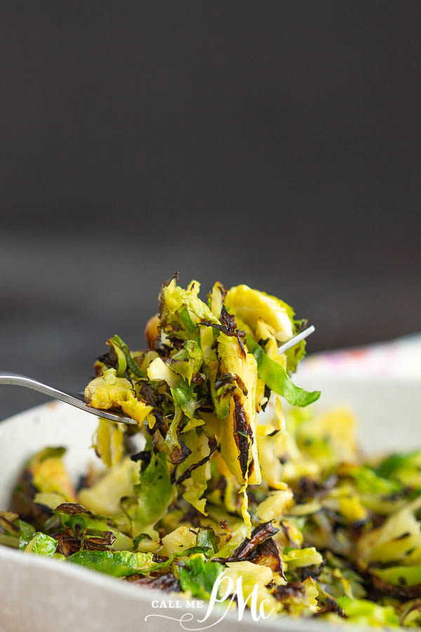 fork full of shaved vegetables Carmaelzied Shaved Brussels Sprouts