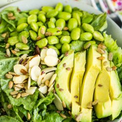 Avocado Edamame Salad Recipe is a superfood dream! It's loaded with lettuce, avocado, edamame, cilantro, green onions & lime vinaigrette #salad #recipe #callmepmc