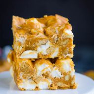 Packed with rich butterscotch, peanuts, & marshmallows, Butterscotch Marshmallow Bars Recipe is an easy, no-bake dessert snack bar.