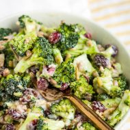 Best Broccoli Salad (Easy Make-Ahead Recipe) is crunchy and satisfying with a sweet and tangy dressing. Low-carb, delicious, refreshing cold salad recipe made with broccoli, bacon, dried cranberries, and sunflower seeds. #callmepmc #recipe #salad #bacon #summersalad #makeaheadrecipe #mealprep