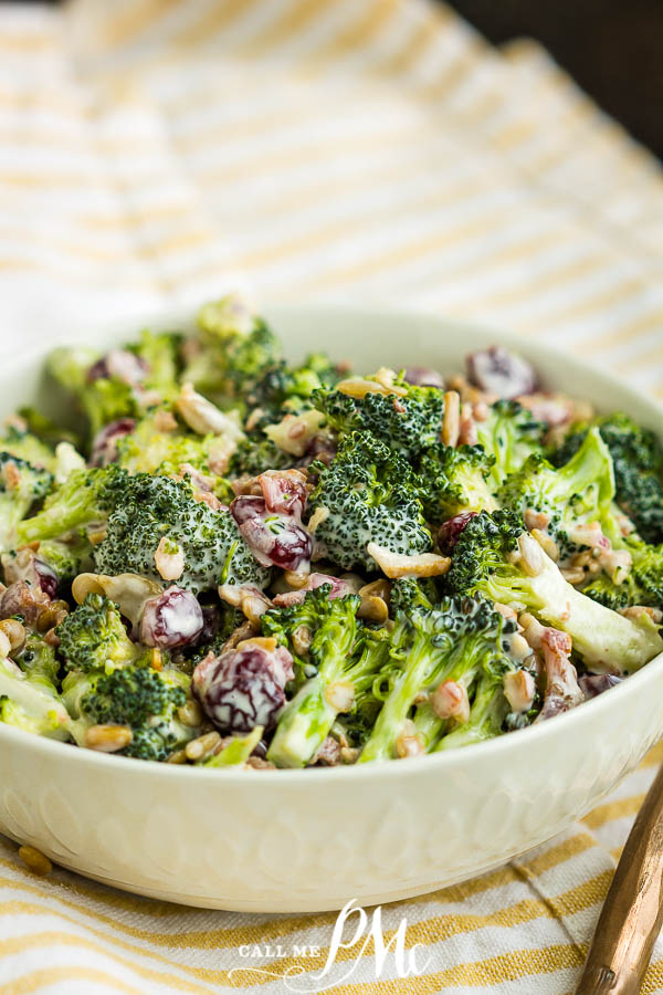 Best Broccoli Salad (Easy Make-Ahead Recipe) is crunchy and satisfying with a sweet and tangy dressing. Low-carb, delicious, refreshing cold salad recipe made with broccoli, bacon, dried cranberries, and sunflower seeds. #callmepmc #recipe #salad #bacon #summersalad #makeaheadrecipe #mealprep