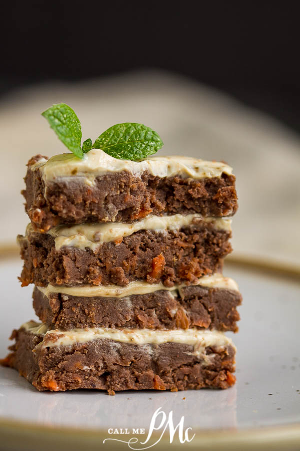 stack of 4 pieces of frosted carrot cake Healthy No-bake Carrot Cake Bars, this recipe taste like a decadent dessert but they're a simple, one-bowl, no-bake, healthy treat!