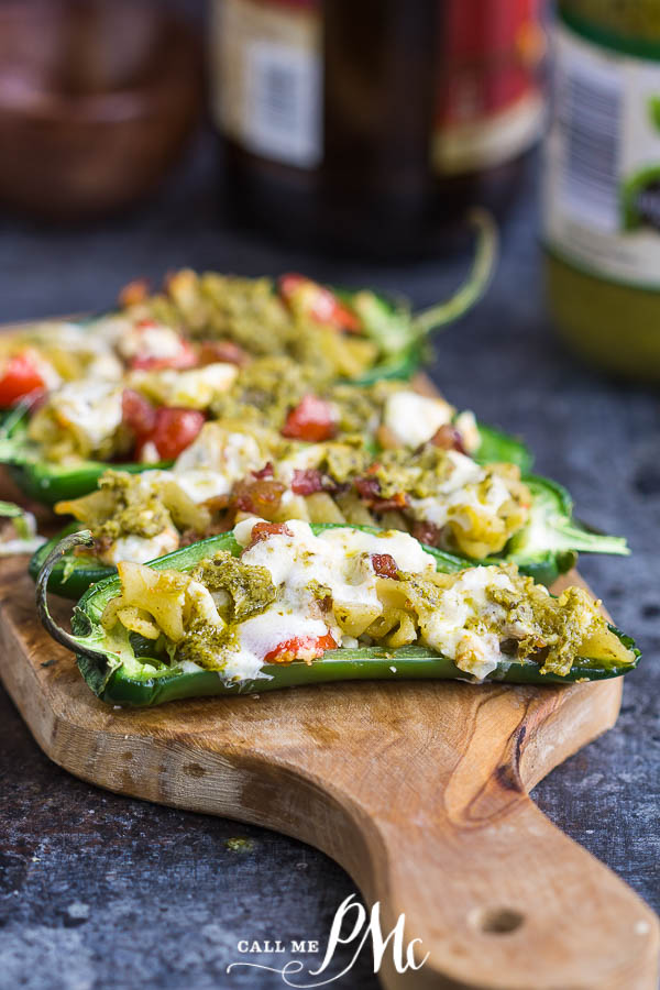 These jalapeno peppers are stuffed with pesto pasta, tomatoes, and cheese. The perfect snack, appetizer, or side.