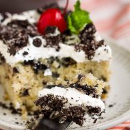 Oreo Poke Cake with a very special frosting!