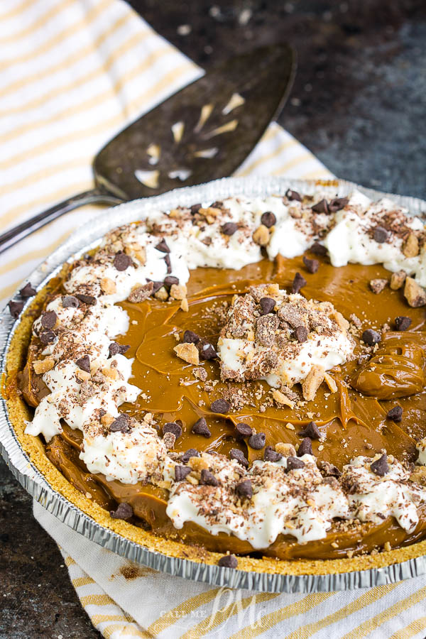 O'Charley's Caramel Pie Recipe has a buttery graham cracker crust, thick rich caramel dulce de leche, whipped cream and chocolate.