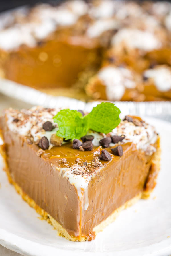 O'Charley's Caramel Pie Recipe has a buttery graham cracker crust, thick rich caramel dulce de leche, whipped cream and chocolate.