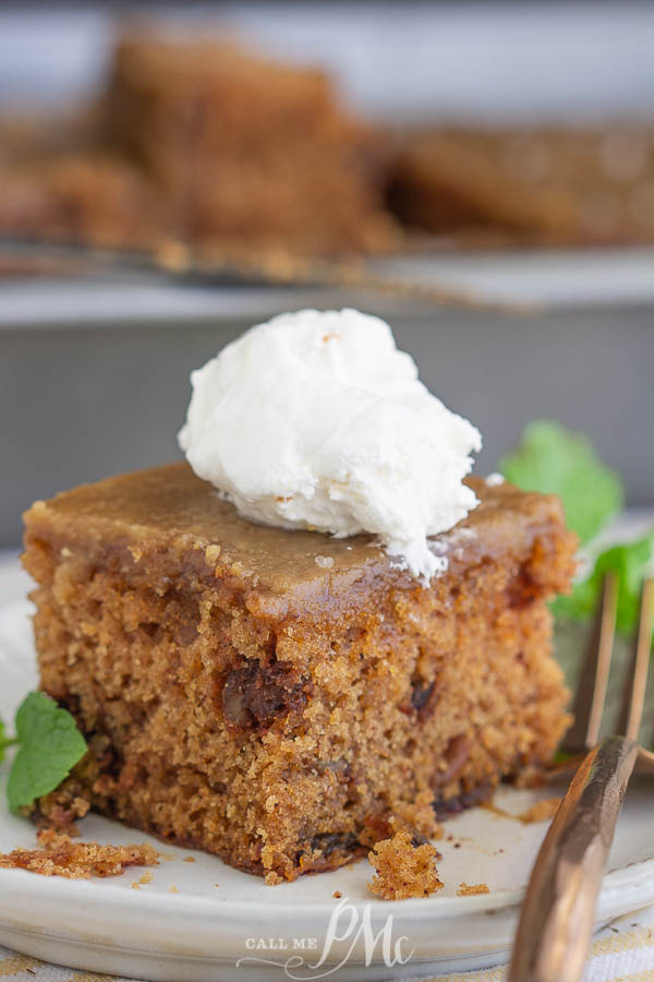 Applesauce Walnut Spice Cake with dates and caramel frosting is a moist, old-fashioned recipe, and one of my family's favorite fall cakes.