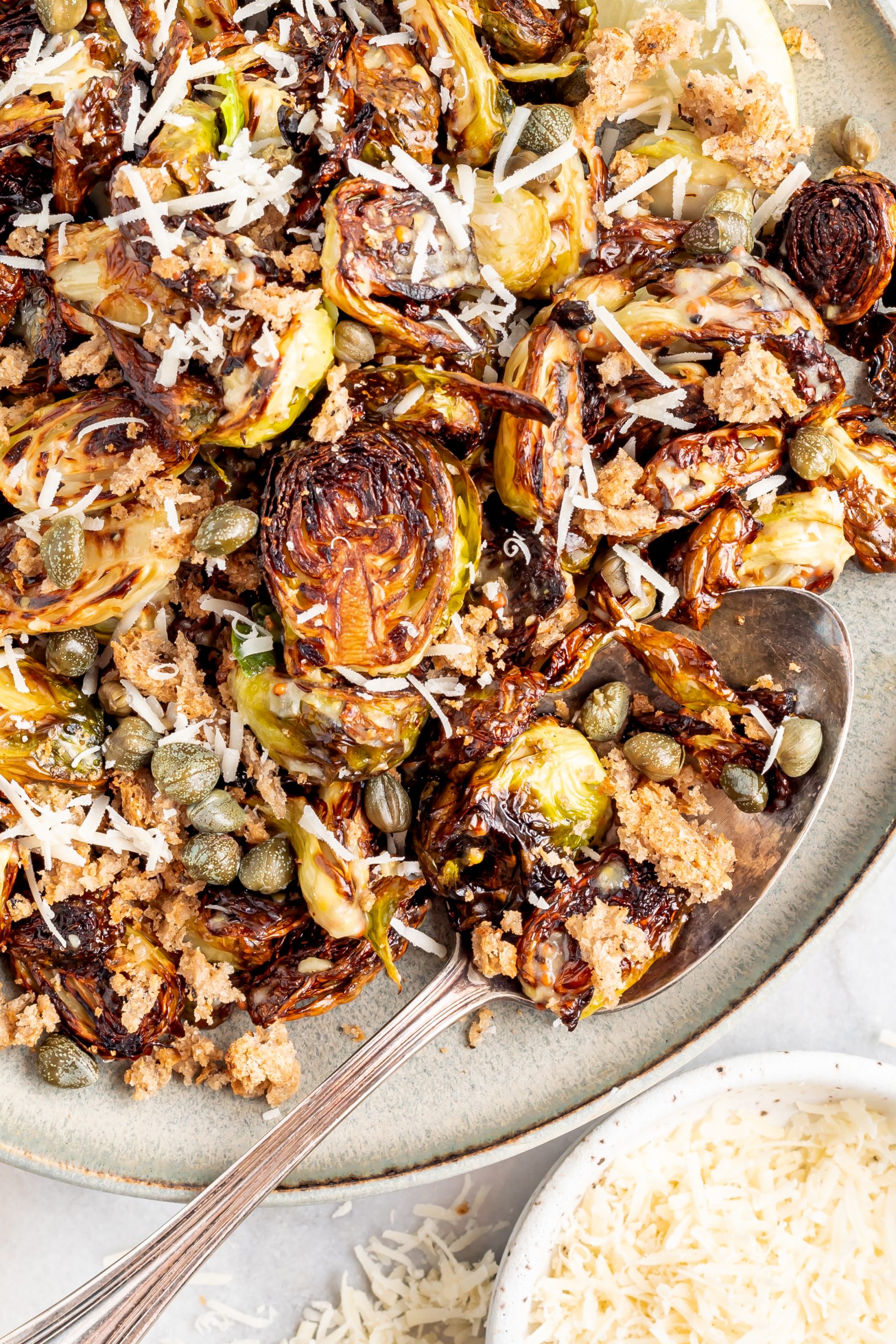 Caesar Roasted Brussels Sprouts Recipe, a new twist on an old favorite, tastes simply amazing! This side dish is simple, light, and spectacularly delicious.