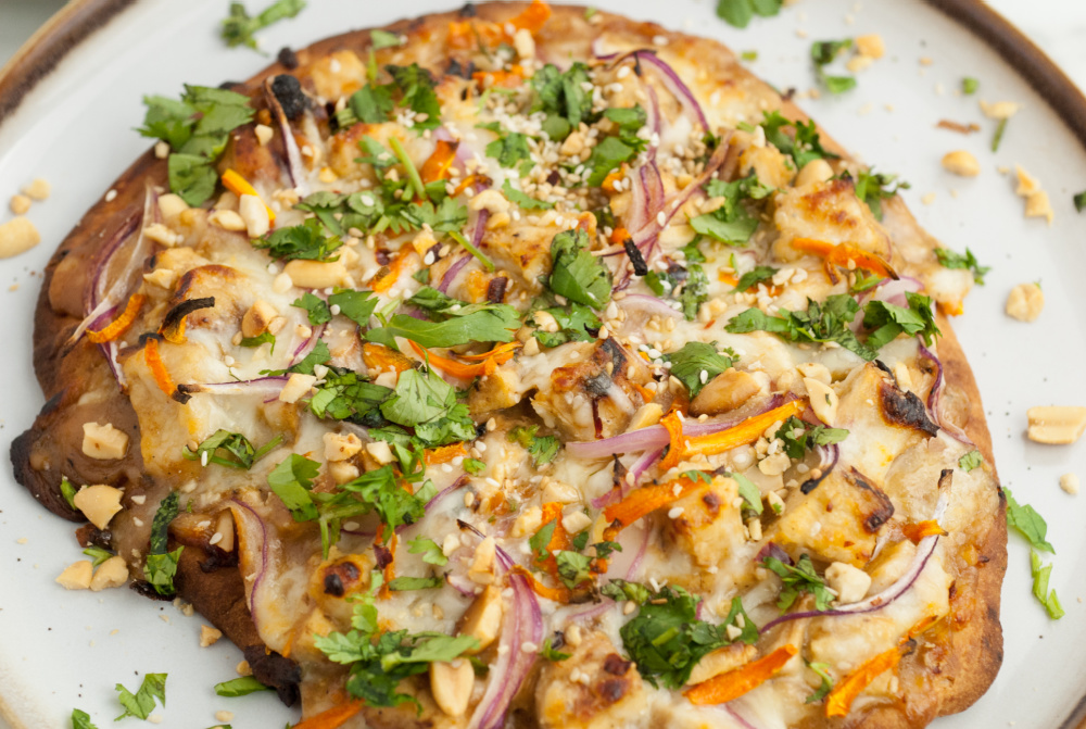 Thai Peanut Chicken Flatbread Recipe, easy college student recipe, bold and delicious flavors like roasted peanuts, tender chicken, and a sweet/spicy sauce