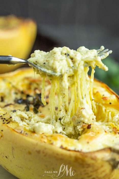 Roasted Cheesy garlic spaghetti squash is combined with a few simple ingredients for a fantastic healthy side dish that goes with everything.