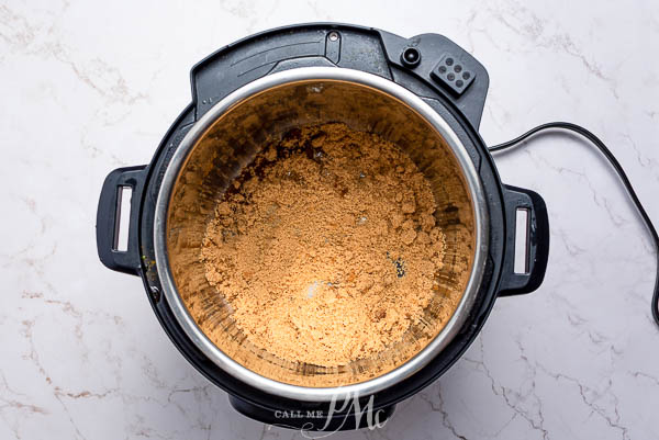 An Instant Pot filled with brown sugar.